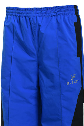 CREST LOGO WARM UP PANTS / BLU 
