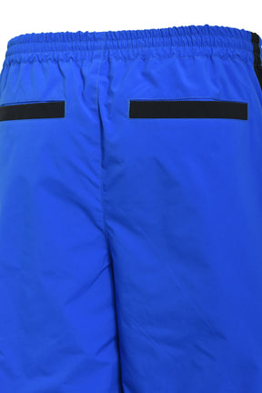 CREST LOGO WARM UP PANTS / BLU 