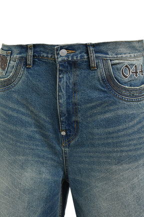 CHAIN ​​EAGLE PATCH DENIM PANTS / IND 