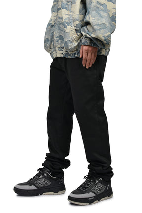 WAXED STAGGERED LOGO SKINNY JEAN / BLK WAX