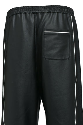 SCRIPT LOGO PIPING COATING TRACK PANTS / BLK